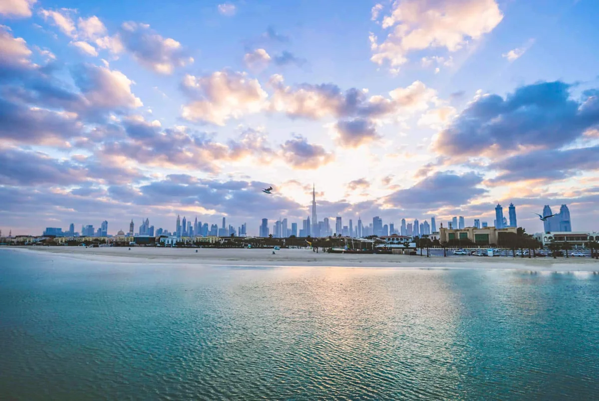 Dubai skyline across the water, the city of Thawfiq’s Marriott role